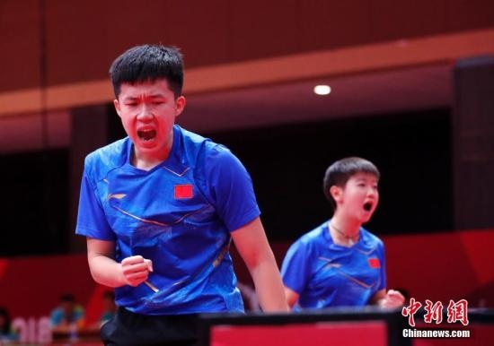 資料圖：雅加達(dá)亞運(yùn)會(huì)，王楚欽/孫穎莎奪得混雙冠軍。 <a target='_blank' href='/'>中新社</a>記者 劉關(guān)關(guān) 攝