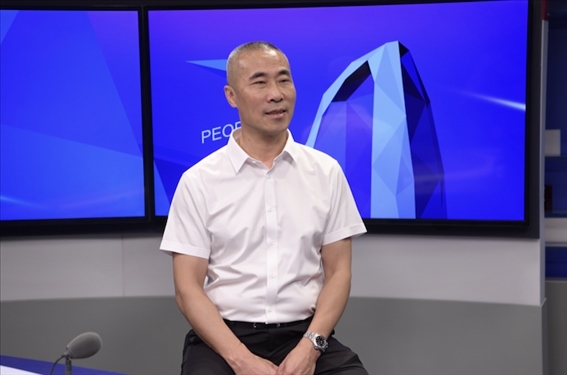 福建省晉江市工商聯(lián)黨組成員王建回。人民網(wǎng)記者 王曉嘯攝