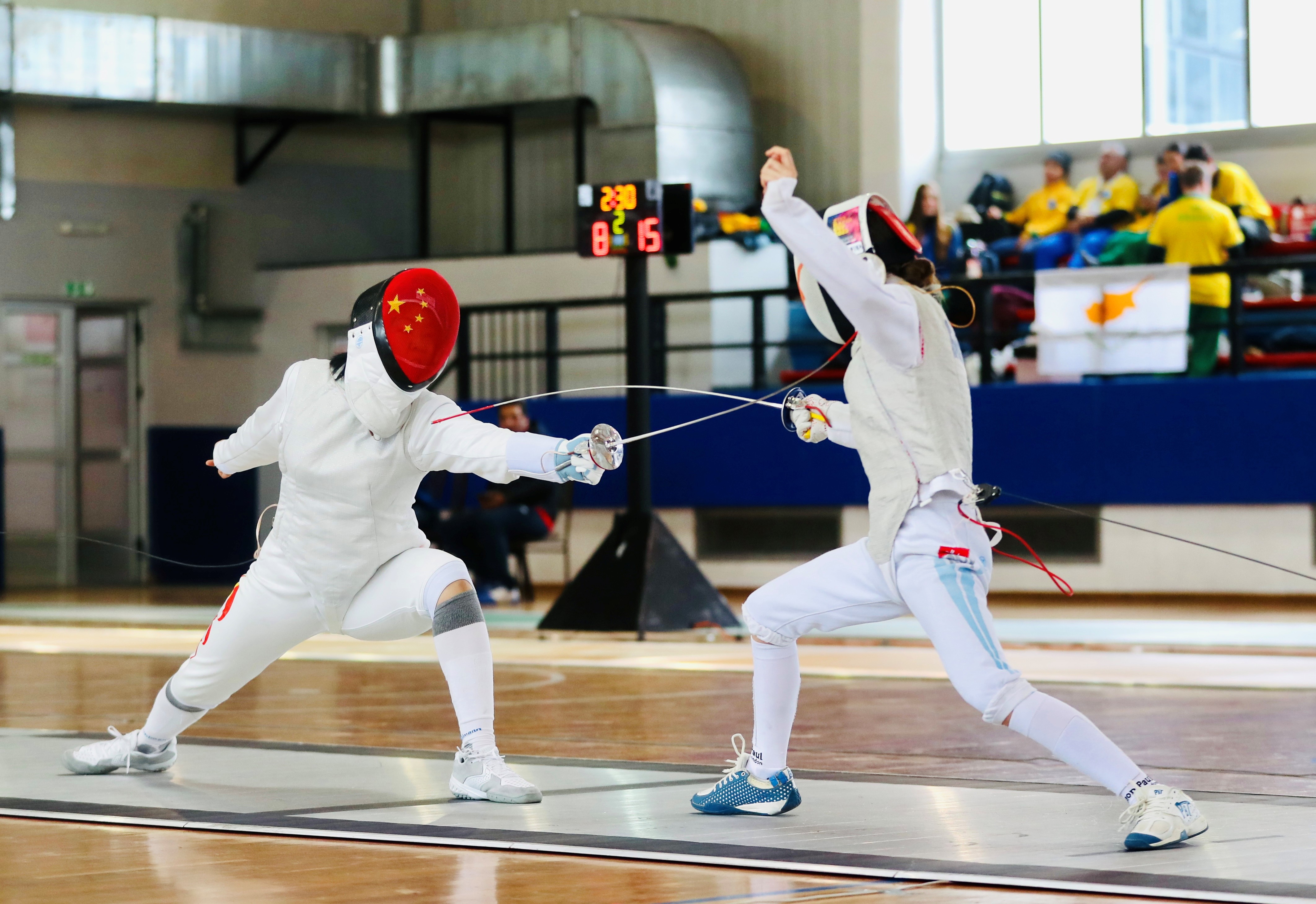 閔文珺（左）在比賽中。圖片來源：中國中學(xué)生體育代表團